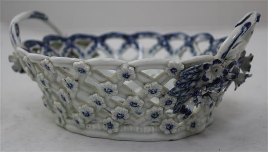 A Worcester Pine Cone pattern oval twin handled basket. c.1775, width 19cm, small losses to flowers